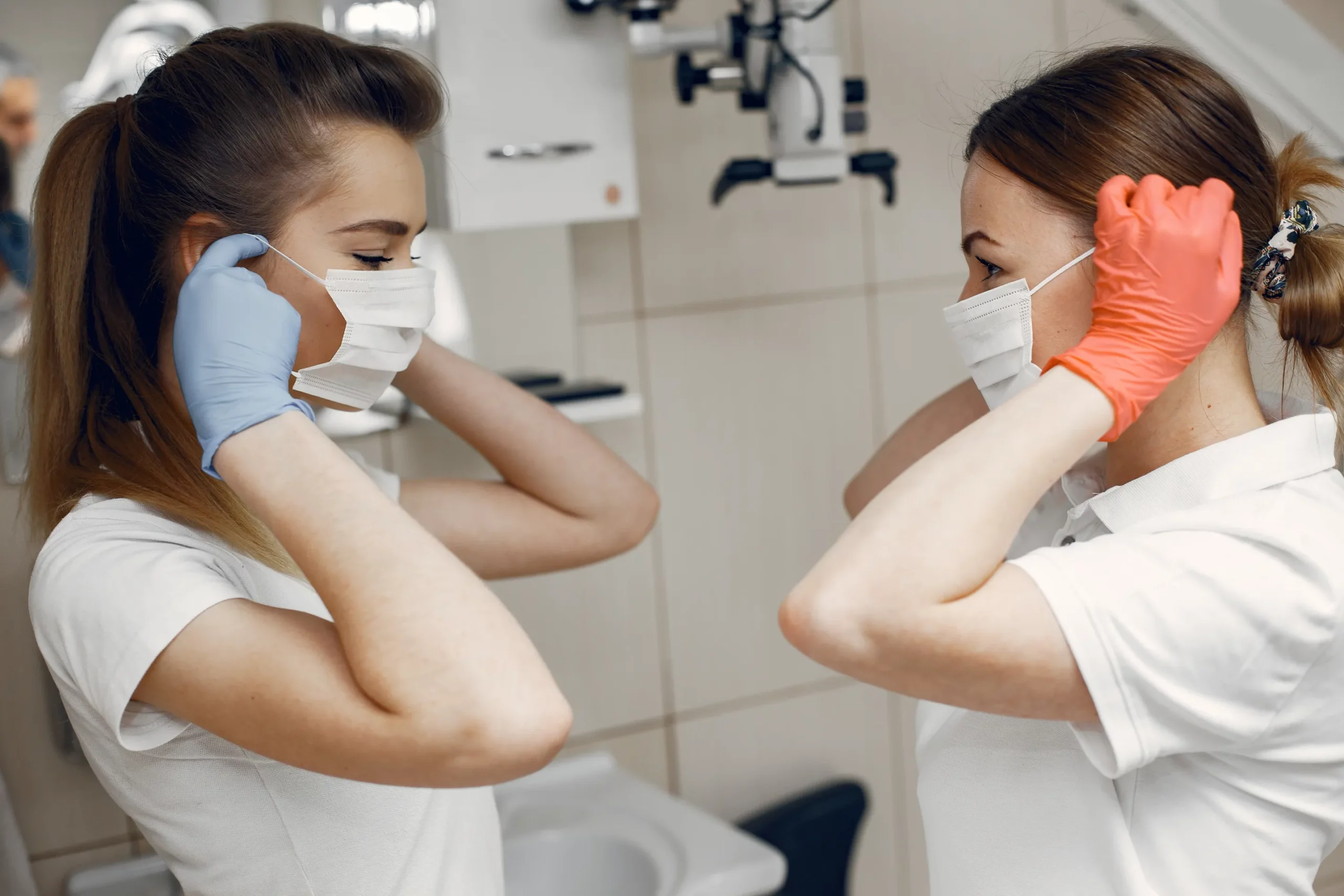 doctors-special-uniform-dentists-wear-protective-masks-girls-look-each-other